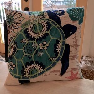 Pillow with seaside theme turtle, starfish, shell